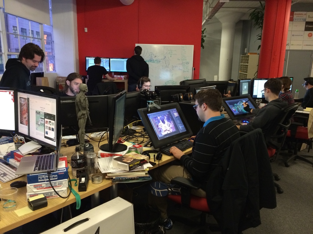 تصویری از طراحان و سازندگان در استودیو بازی سازی