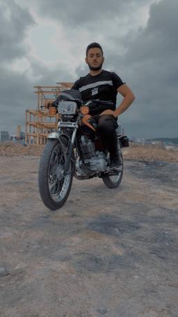 رضا کاهه موتور سوار