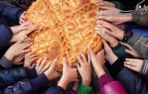 تقسیم نان – عکس از تابناک