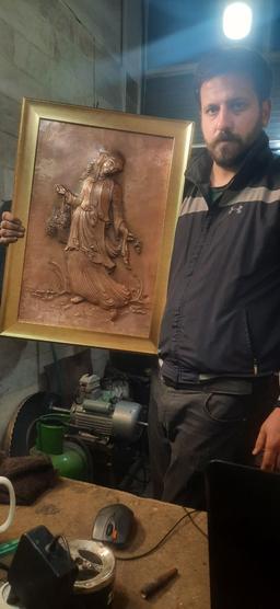 قلمزنی جواد داودی .برجسته