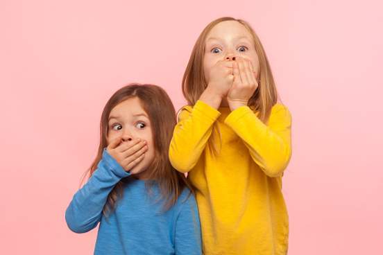 two girls covering their mouths-7894-847df8bf80ac6605c8e27d07cc572cec@1x.jpg