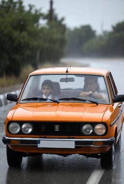 دنده عقب به صبح بارانی کنکور با پیکان نارنجی